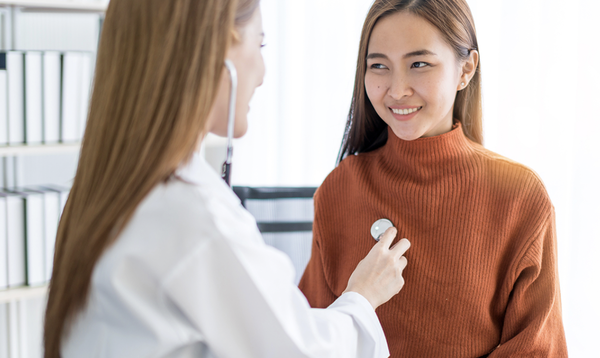 doctor checking patient